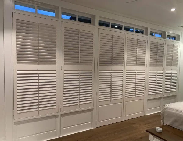 Specialty shutters incorporating solid panels