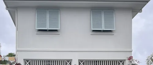 Decorative fixed louvre shutters